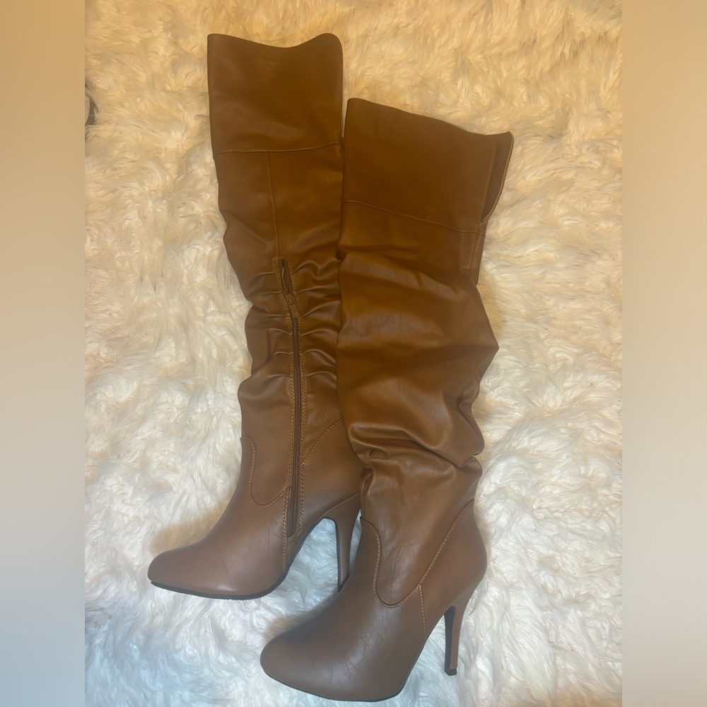 Over the knee heeled boots